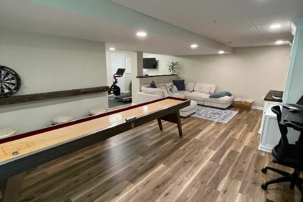 StoneBridge Renovations basement remodeling with a game room