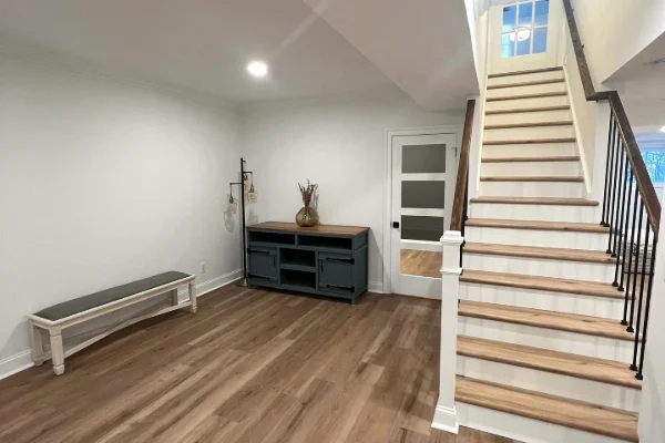 StoneBridge Renovations upgraded living room space with new flooring